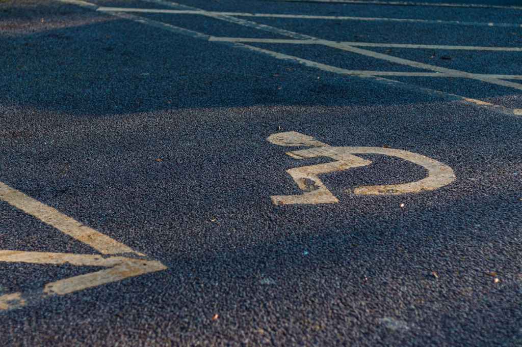 international symbol of access on asphalt