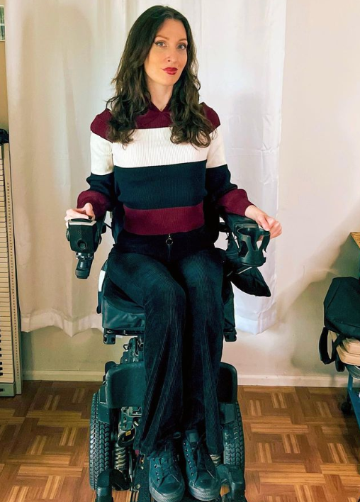 Anomie uses her Quantum power wheelchair for independence