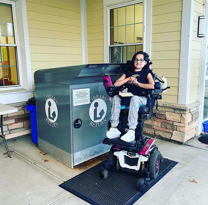 Sakina in her Quantum Rehab Wheelchair