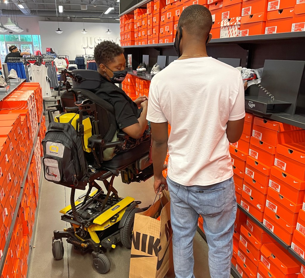 Merlisha shops in her Quantum Power Wheelchair