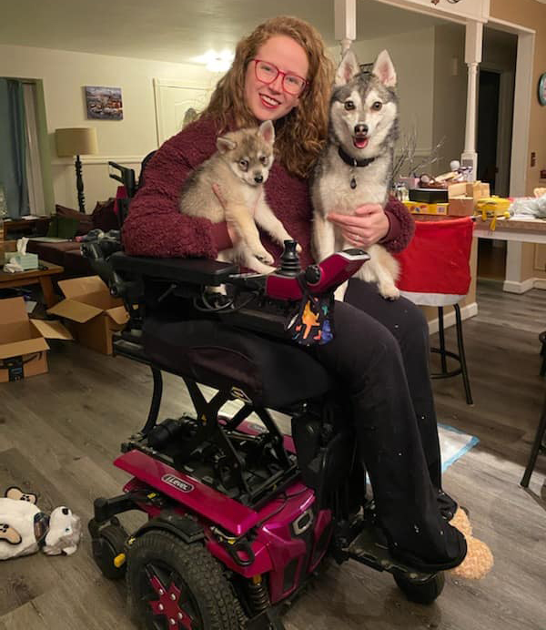 Stephanie, elevated at iLevel, ibn her Quantum Power Wheelchair