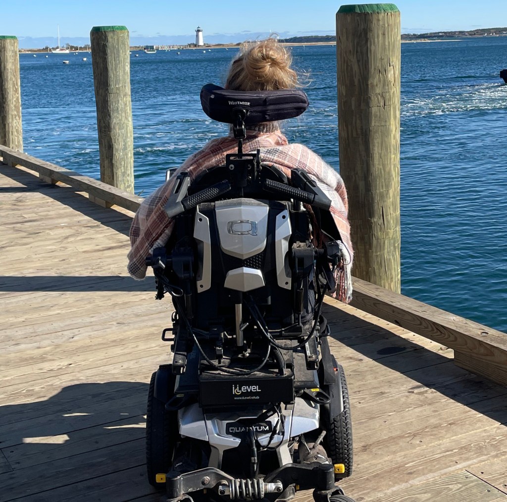 iLevel on her Quantum Power Wheelchair 