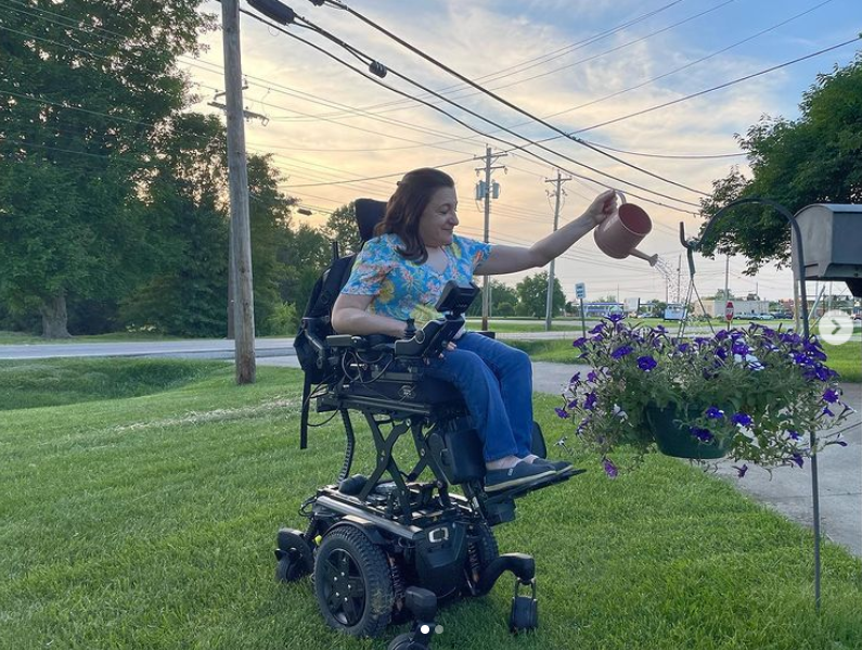 Kara in her Quantum power wheelchair with iLevel